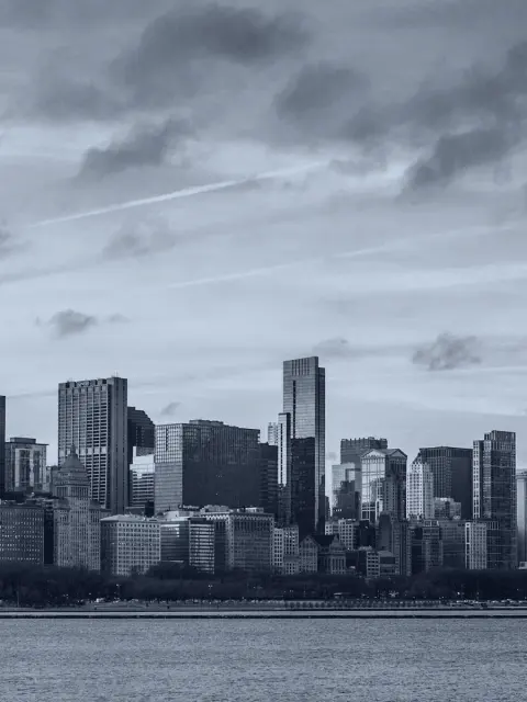 The Chicago skyline seen across Lake Michigan at dusk